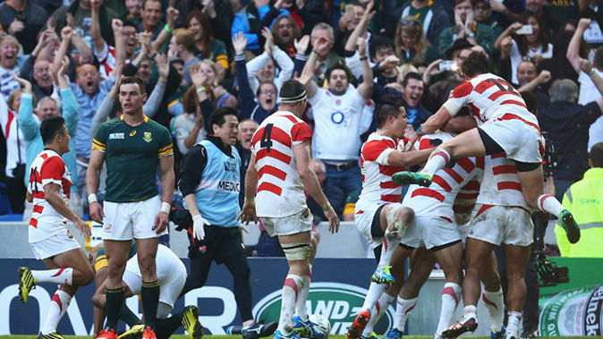 Japan celebrating the winning try against South Africa (Getty Images)