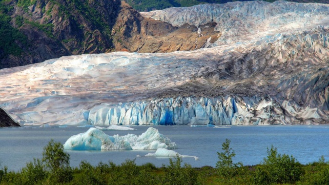 At Mendenhall Glacier in Alaska, a basin of icy meltwater has broken through its glacial barrier, flooding towards Juneau. Photo / Getty Images