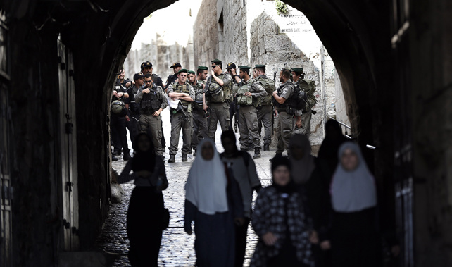 Israeli police patrol a street in the Muslim quarter in Jerusalem's Old City (Getty Images) 