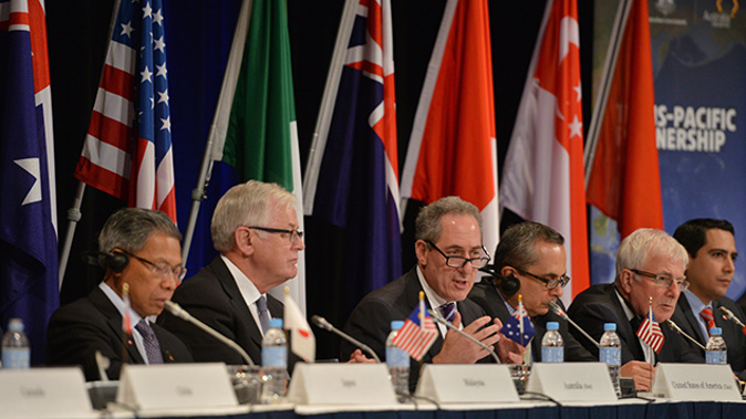 Negotiators and Trade Ministers at a TPPA news conference in 2014 (Getty Images)