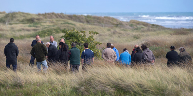 A blessing yesterday held on the beach where Alex Fisher's body was found (Mark Mitchell)