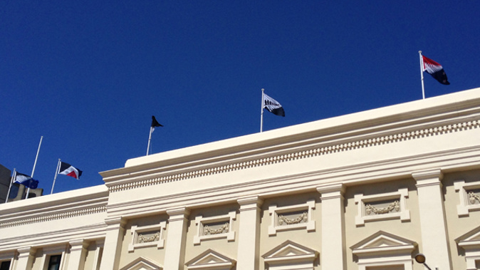 Alternative flags fly above the Wellington Town Hall (Josh Price)