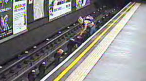 PHOTOS: Child rescued from London tube tracks