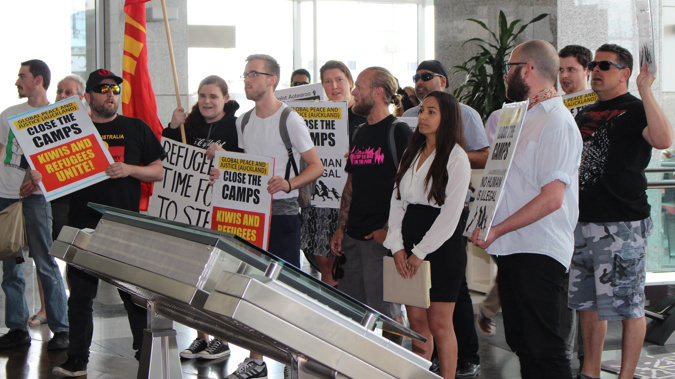 Protestors inside Australian consulate (Photo / Alex Braae)