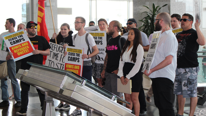 Protestors inside Australian consulate (Photo / Alex Braae)