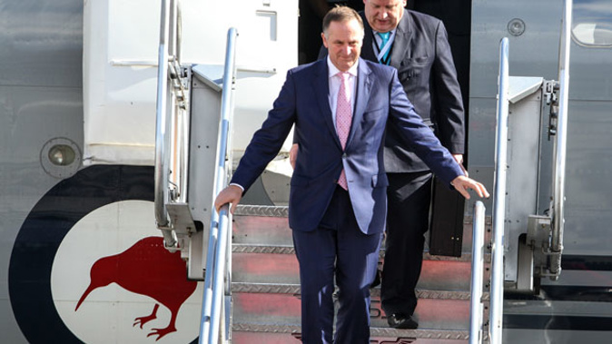 Prime Minister John Key arrives at the APEC forum in the Philipines (Getty).