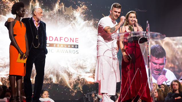 Broods receiving an award presented by Mick Fleetwood (Topic Photography)