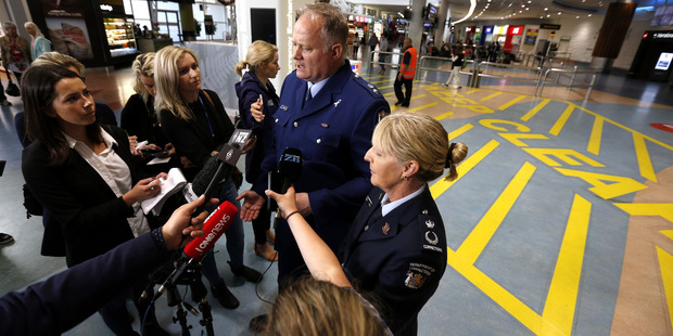 Police Superintendant John Tims and Jeanette Burns from the Department of Corrections address the media at Auckland International Airport after the deportation plane arrived (NZME.) 