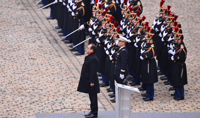 French President Francois Hollande attends a ceremony to pay a national homage to the victims of the Paris attacks (Getty Images) 
