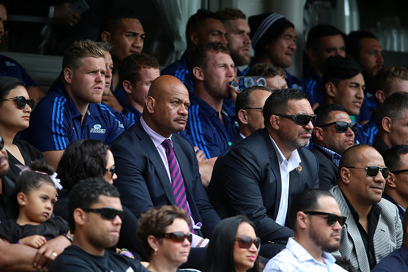 Former Tongan rugby international Willie Lose (C) listens to the speakers