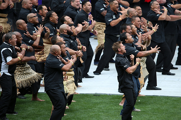 Former Wesley College students perform a haka as Jonah's casket leaves the field