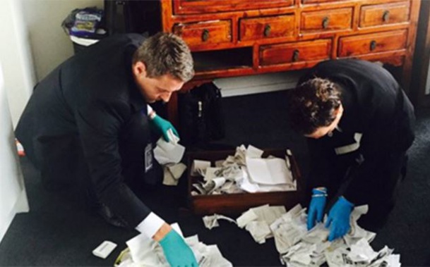 Police search Barry's apartment (Supplied)