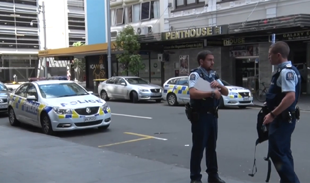 Police outside the apartment building on Gore Street (NZME.)