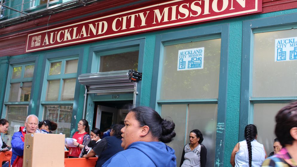 Crowds have gathered outside the City Mission in Auckland for presents and food parcels.  