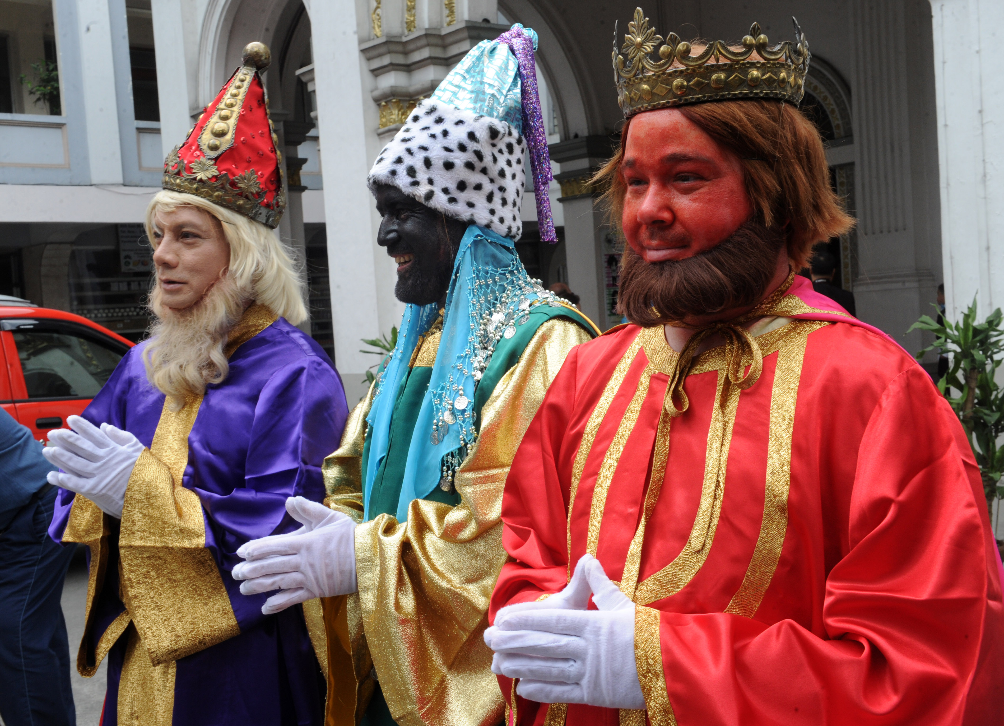 Men dressed as the three wise men from the Nativity story in the Philippines 