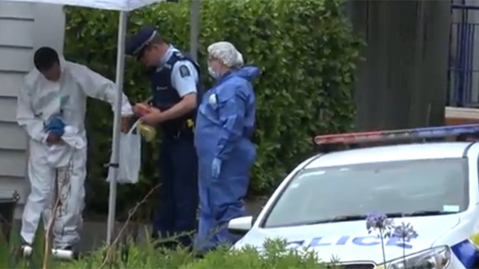 Police investigating the scene of the crime (NZ Herald)