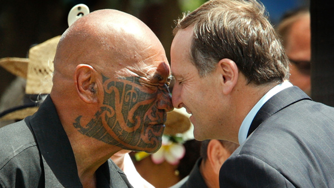 Ngapuhi elder Kingi Taurua greeting PM John Key at Waitangi (Newspix - Brett Phibbs)