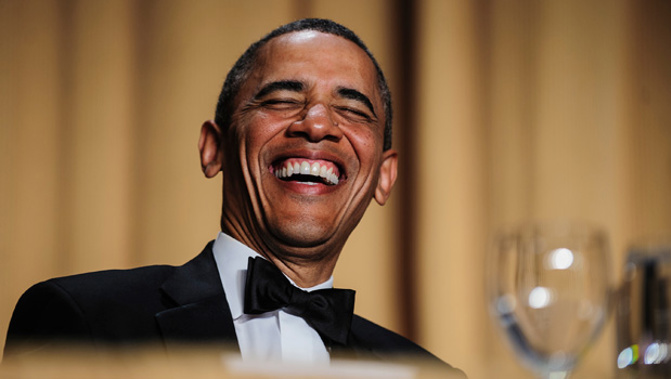 President Barack Obama enjoying a hearty laugh (Getty Images)