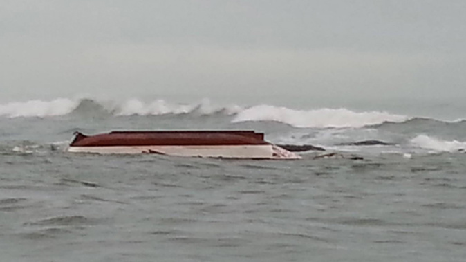 An image of the capsized waka (Supplied - 1XX)