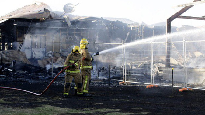 Firefighters battling the blaze at Te Wananga o Ruakawa (Twitter: @CopsPaul)