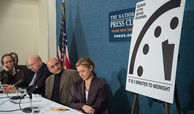 Members of the Bulletin of Atomic Scientists reveal the latest 'Doomsday Clock' (Getty Images)