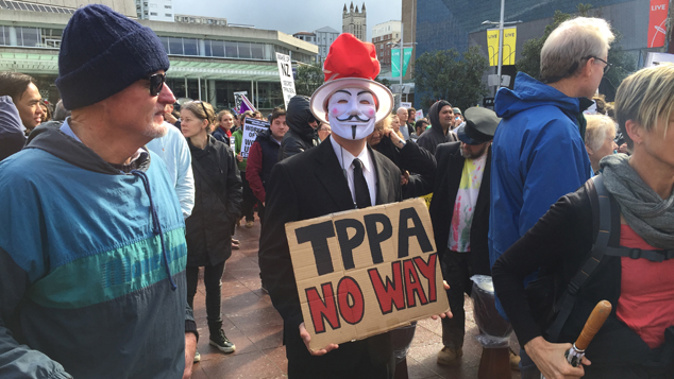 A man protesting the TPP at a protest last year (Getty Images).
