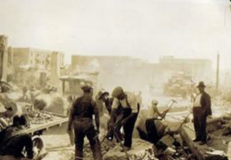 Rescue parties digging through rubble (NZ History)