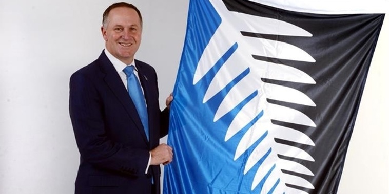 Photo / John Key with Kyle Lockwood's black, white and blue fern flag.