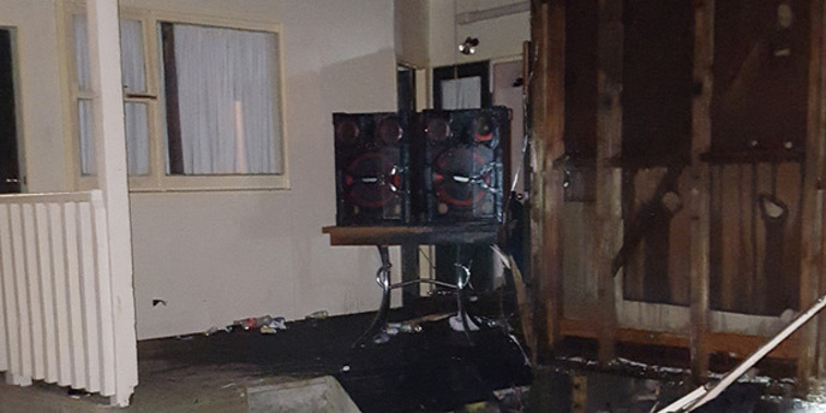 A Dunedin flat was set on fire this weekend after students lit a couch on fire (supplied).