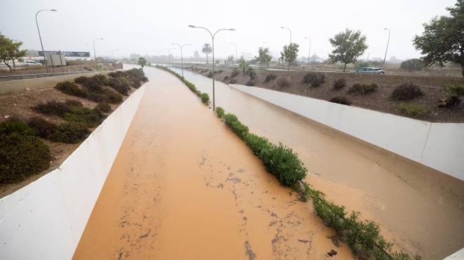 A view of the flooded Ibiza Airport highway. Spain's Mediterranean islands of Ibiza and Formentera closed beaches and schools as torrential rain triggered floods and the highest weather alert. Photo / Vicent Mari, AFP