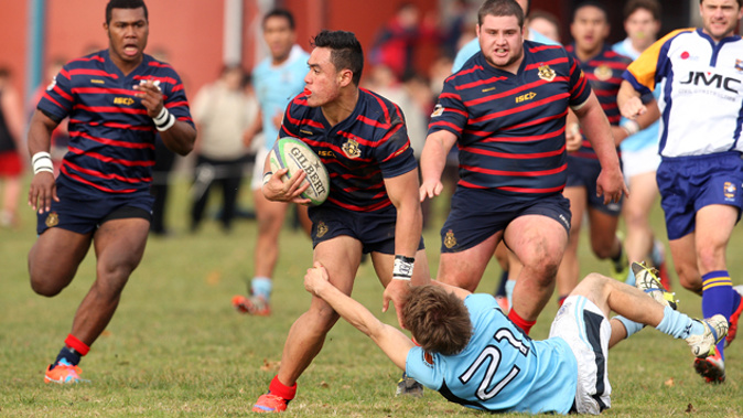 A player rampages through the defence in a Napier BHS vs Rotorua BHS school rugby derby (Newspix)