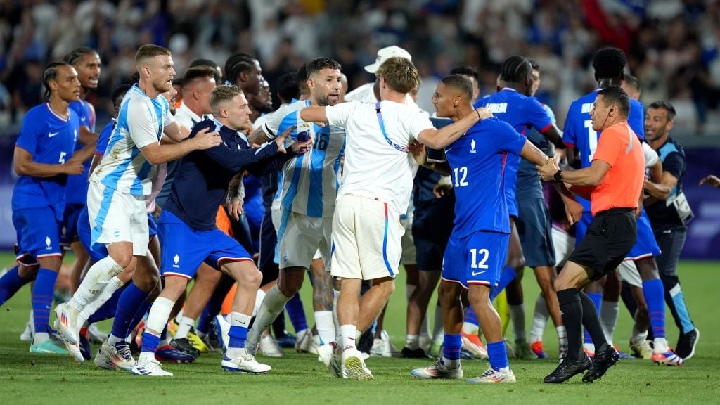 BORDEAUX, FRANCE - AUGUST 02: Nicolas Otamendi #16 of Team Argentina and Enzo Millot #12 of Team France clash after the Men's Quarterfinal match between France and Argentina during the Olympic Games Paris 2024 at Nouveau Stade de Bordeaux on August 02, 2024 in Bordeaux, France. (Photo by Juan Manuel Serrano Arce/Getty Images)