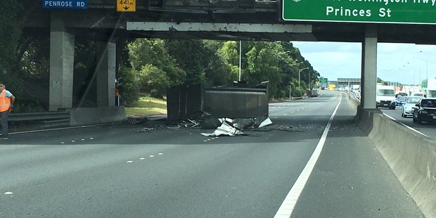 The truck's load which was thought to be rubbish was scattered across southbound lanes at Ellerslie (Supplied).