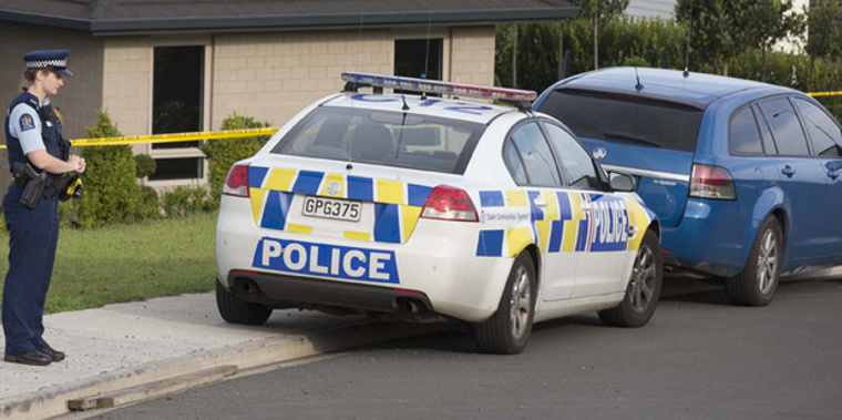 Police at the scene of the hostage drama. Photo / Brett Phibbs