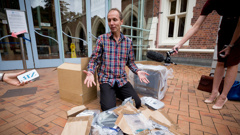 Nicky Hager with his destroyed computer outside Auckland High Court (Dean Purcell). 