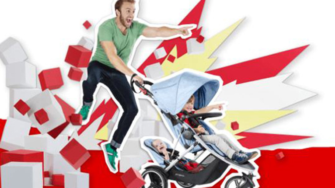 A model displays the Phil and Ted's Dash Baby Stroller (via website)