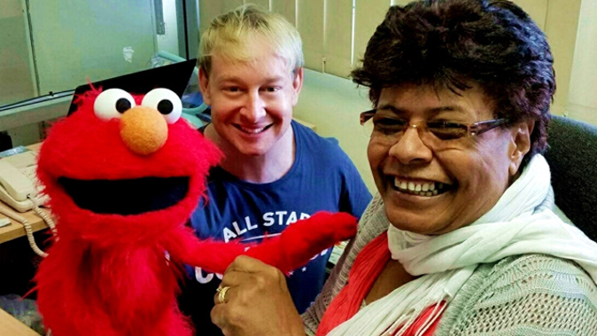 Elmo with Chris Lynch and Marica Kepa (Red Cross Fiji)