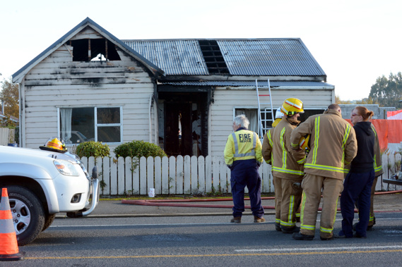 The burnt out house on Union St, Milton, where it is suspected a man, the occupant of the house, was killed. (Otago Daily Times)