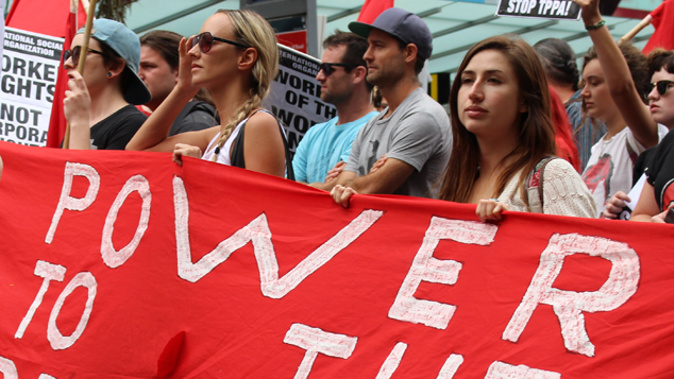 Protests against the TPPA taking place on Queen St (Alex Braae)