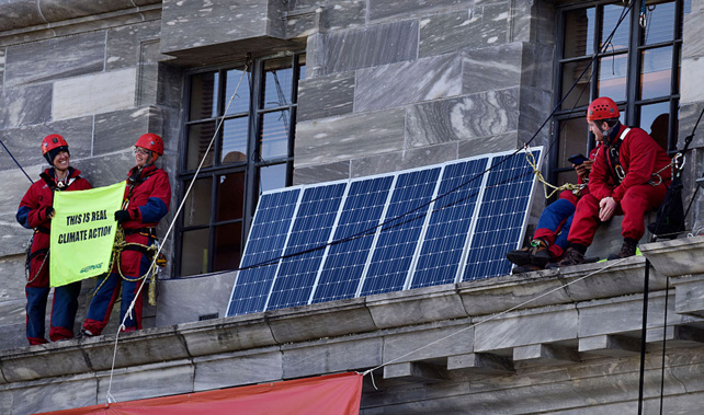 Greenpeace protesters, who used modern technology to scale the facade of New Zealand's Parliament (Supplied)