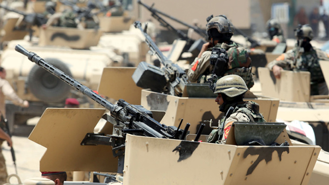 Iraqi soldiers mobilising on the outskirts of Fallujah (Getty Images)