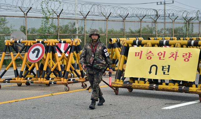 A South Korean soldier standing guard at the DMZ between the North and South (Getty Images)
