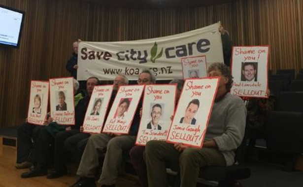 Protesters hold signs against the sale of City Care (Charlie Greenhalgh)