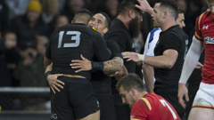 Aaron Smith celebrates with George Moala after the All Blacks centre scored in the third test win over Wales. (NZ Herald/Brett Phibbs)