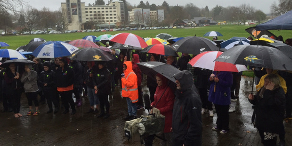 Crowds stand in the rain at the Rotorua March for Moko (Alan Gibson) 