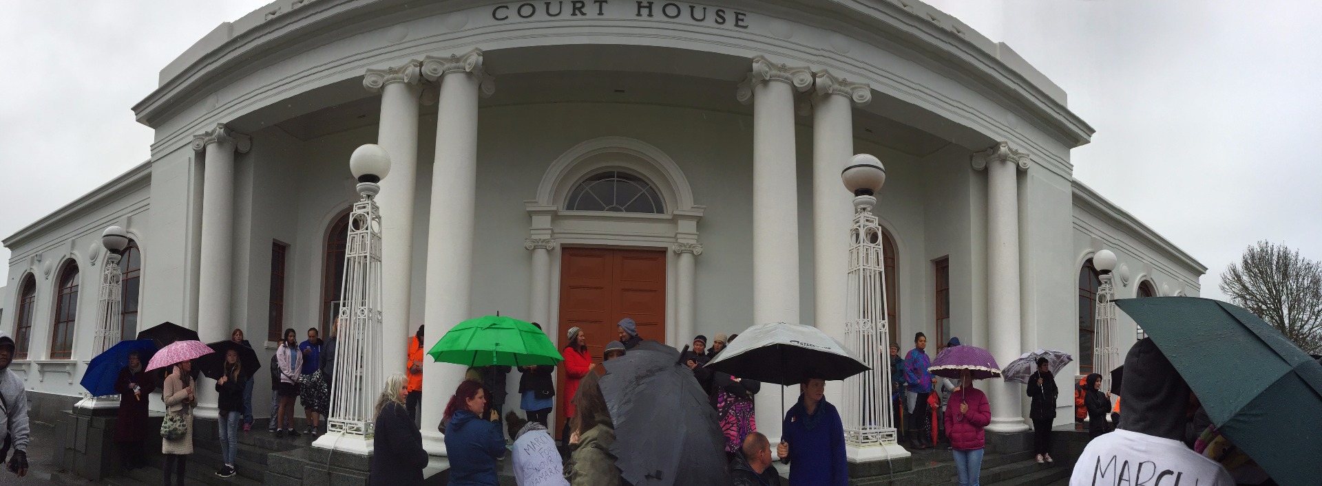 Crowds in Hamilton gathering in heavy rain (Belinda Feek) 