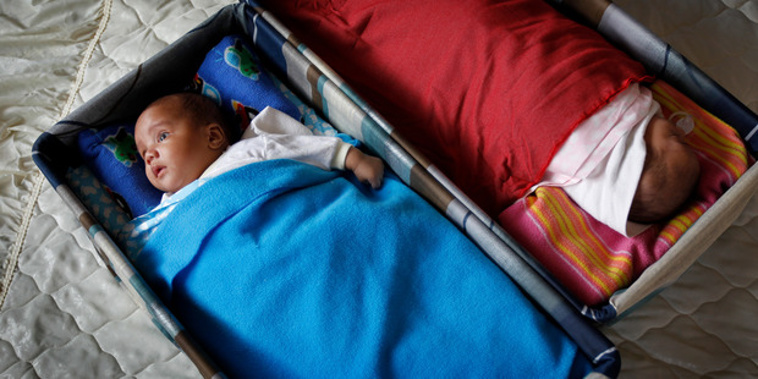 An example of the pepi-pods, portable bassinets allowing babies to safely sleep in bed beside their parents (Sarah Ivey)