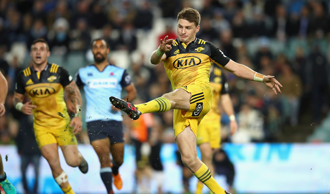 Beauden Barrett of the Hurricanes kicks ahead (Getty Images)