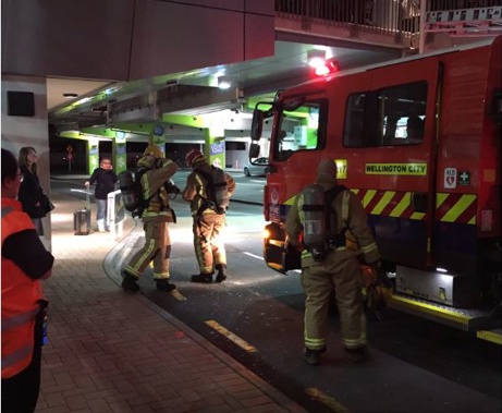 A fire crew is at Wellington Airport, which has been evacuated after a smoke alarm was triggered this evening. (Twitter/@LauraTupou)