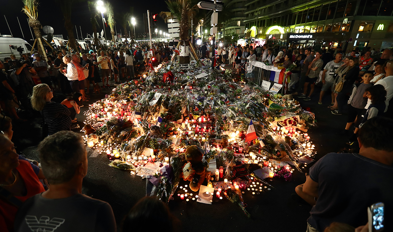 People gather and lay tributes on the Promenade des Anglais, Nice (Getty Images) 